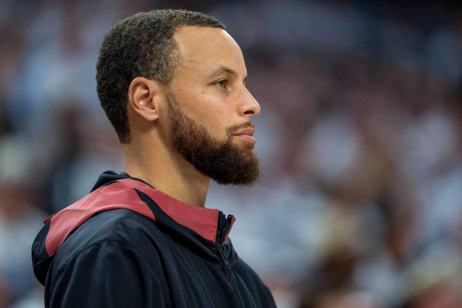 Golden State Warriors guard Stephen Curry (30) looks on from the bench against the Minnesota Timberwolves in the second half during game two of the second round for the 2025 NBA Playoffs at Target Center.