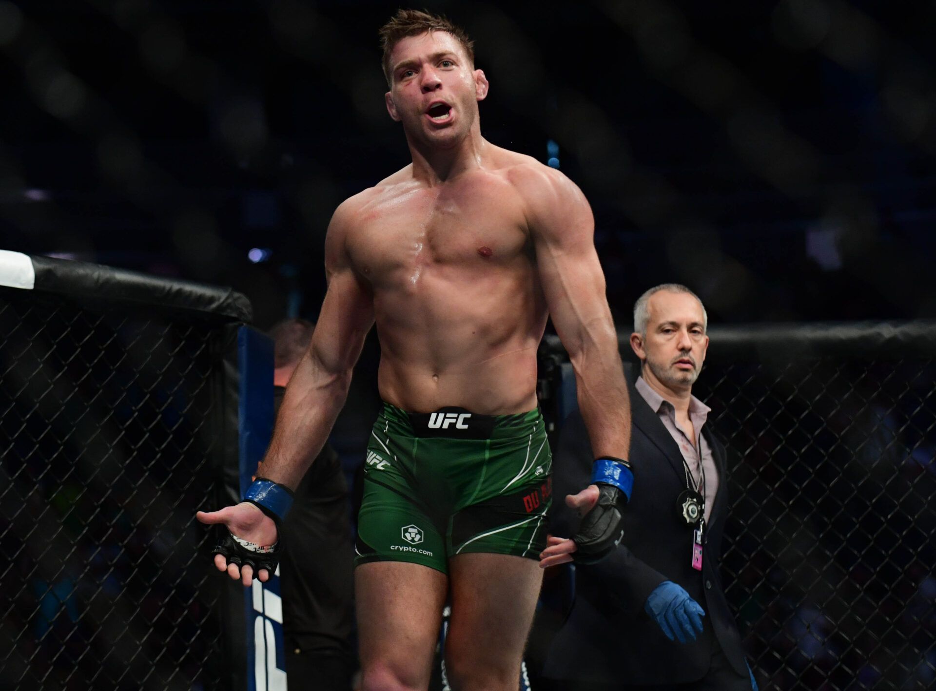 Dricus du Plessis celebrates his knockout victory against Trevin Giles during UFC 264 at T-Mobile Arena.