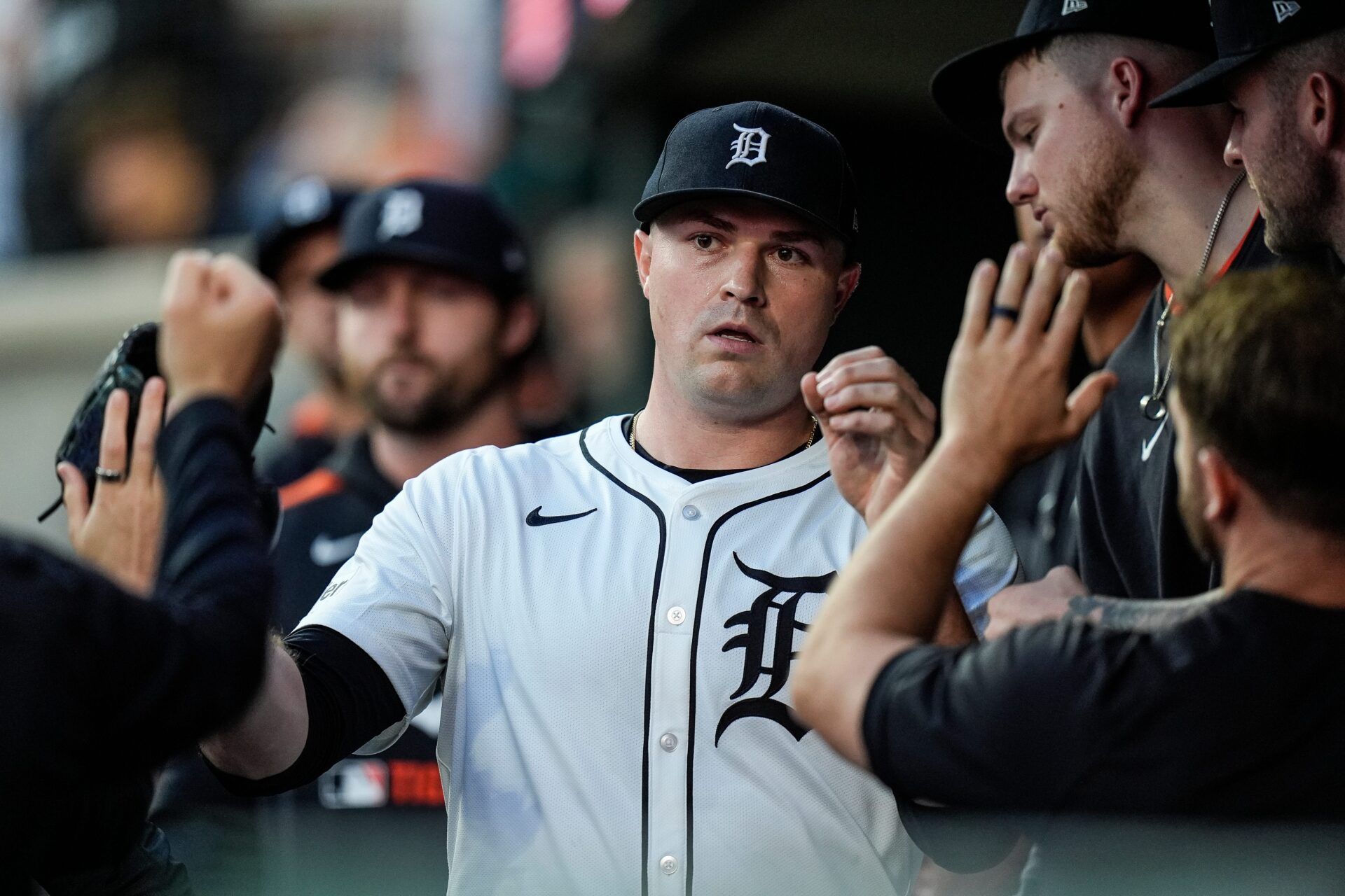 Detroit Tigers pitcher Tarik Skubal (29) high-fives teammates in the dugout after pitching change during the seventh inning at Comerica Park in Detroit on Wednesday, May 14, 2025.