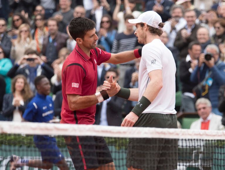 Novak Djokovic (SRB) and Andy Murray (GBR) at the net after their match on day 15 of the 2016 French Open.