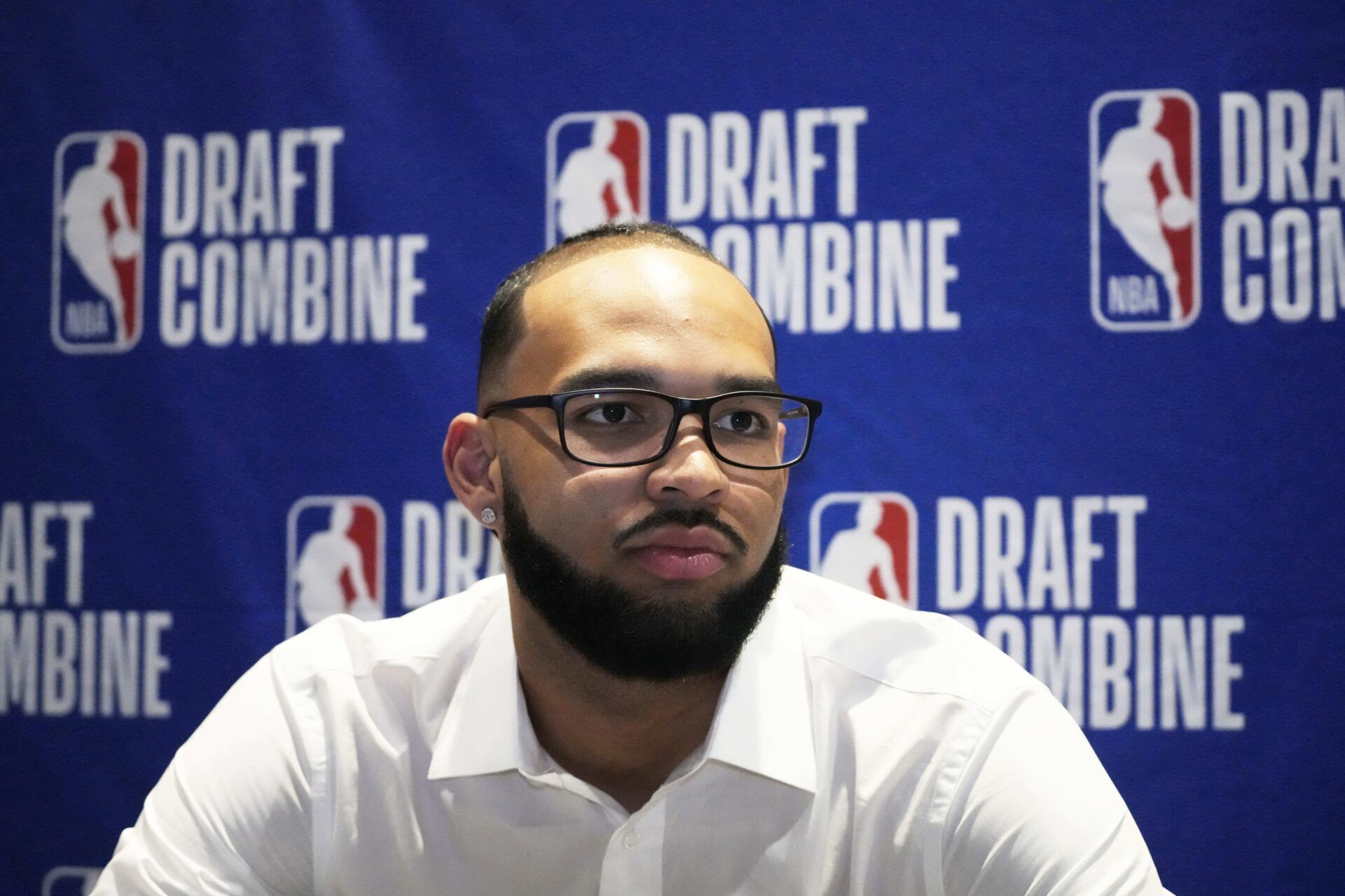 Johni Broome talks to the media during the 2025 NBA Draft Combine at Marriott Marquis Chicago.