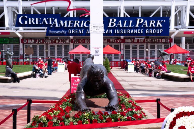 Roses are placed around the Pete Rose statue outside Great American Ball Park during the Cincinnati Red’s Pete Rose night at the ballpark on Wednesday, May 14, 2025 in Cincinnati. Albert Cesare/The Enquirer / USA TODAY NETWORK via Imagn Images