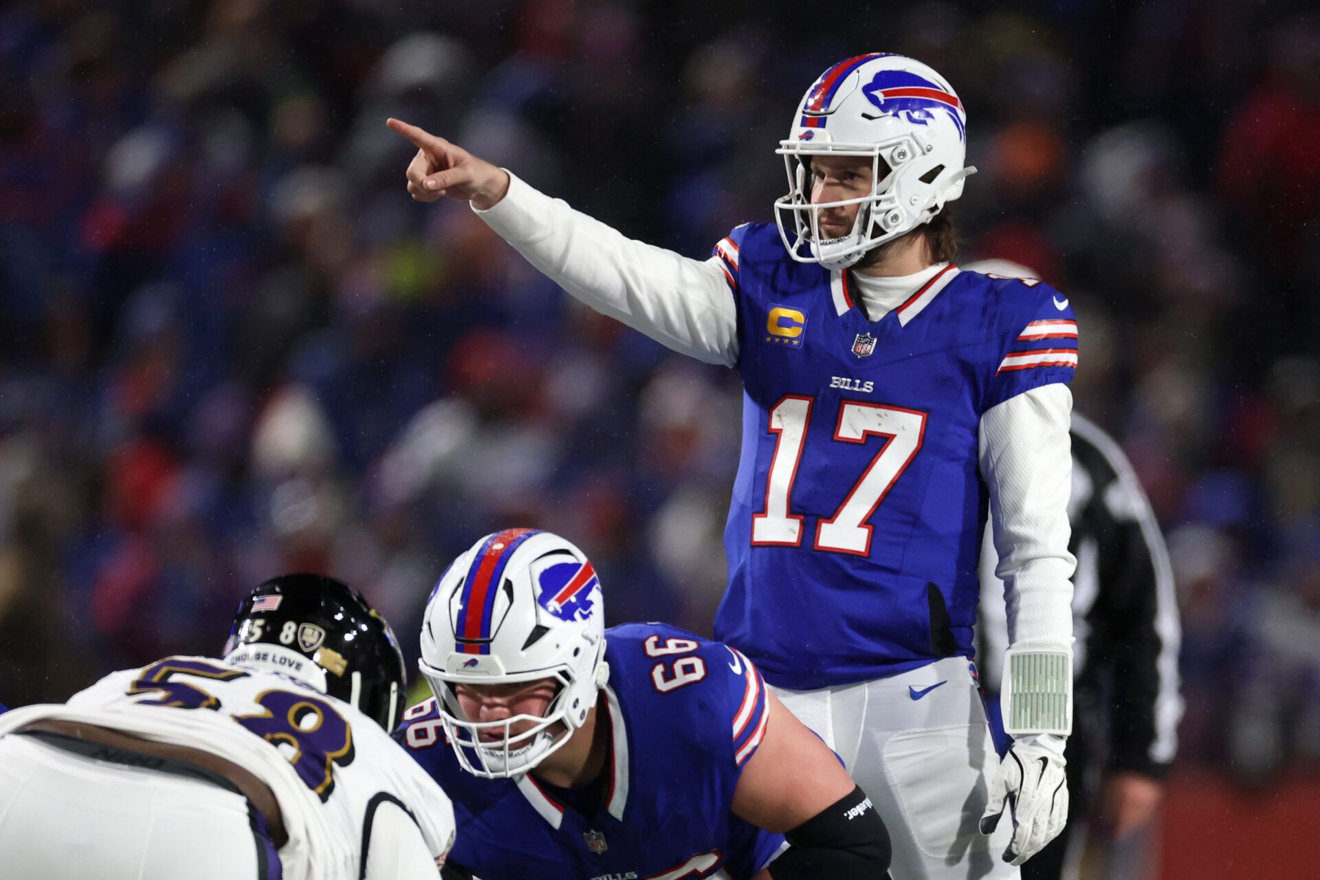 ORCHARD PARK, NEW YORK - JANUARY 19: Josh Allen #17 of the Buffalo Bills directs his team against the Baltimore Ravens in the second quarter during the AFC Divisional Playoff at Highmark Stadium on January 19, 2025 in Orchard Park, New York.  (Photo by Al Bello/Getty Images)