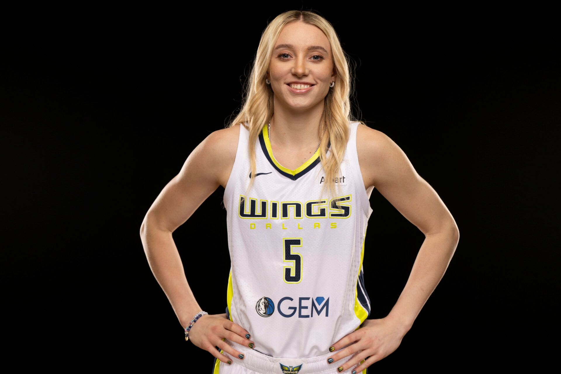 Dallas Wings guard Paige Bueckers poses for a photo during the 2025 Dallas Wings Media Day.
