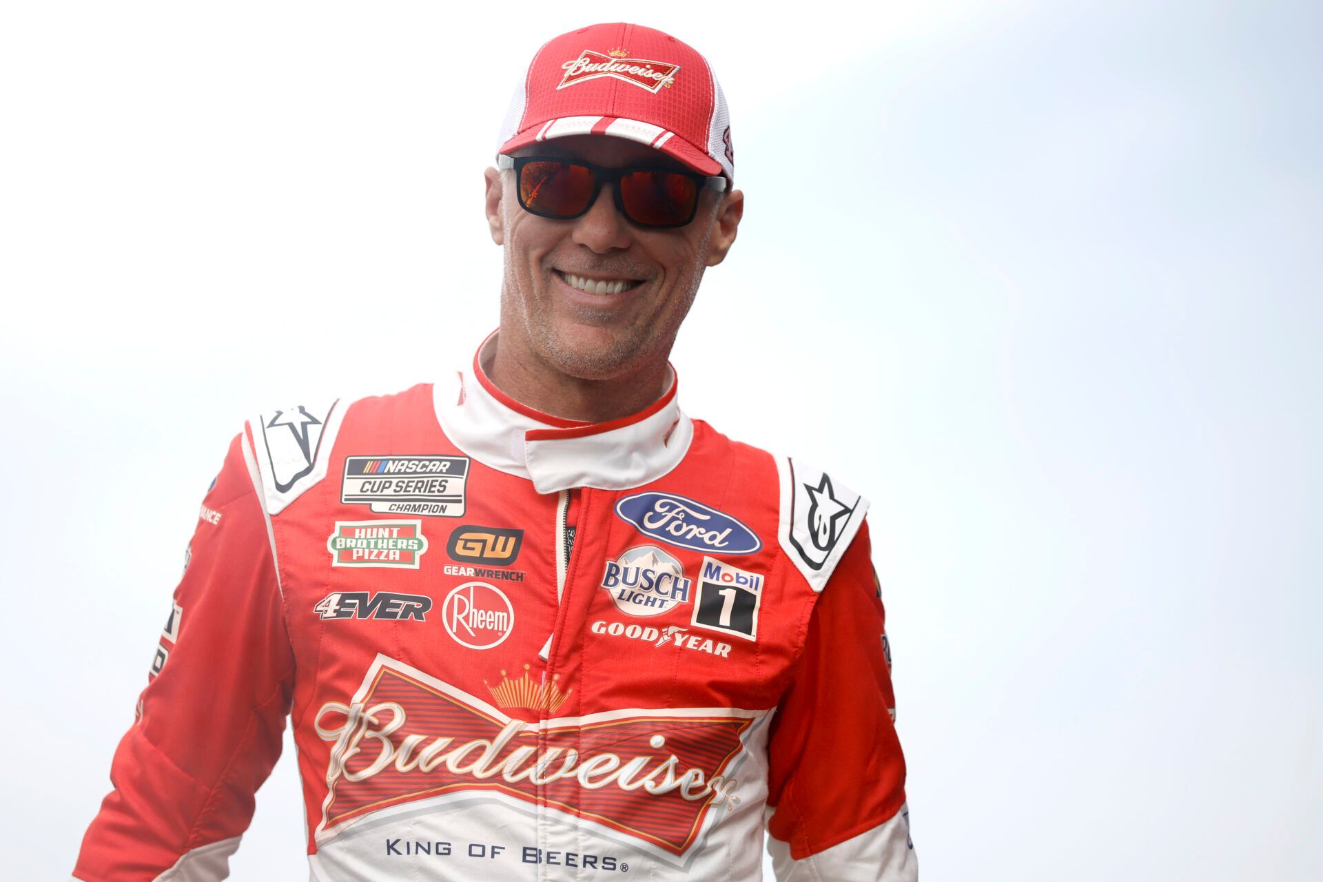 HOMESTEAD, FLORIDA - OCTOBER 22: Kevin Harvick, driver of the #4 Budweiser Ford, walks onstage during driver intros prior to the NASCAR Cup Series 4EVER 400 Presented by Mobil 1 at Homestead-Miami Speedway on October 22, 2023 in Homestead, Florida. (Photo by James Gilbert/Getty Images)