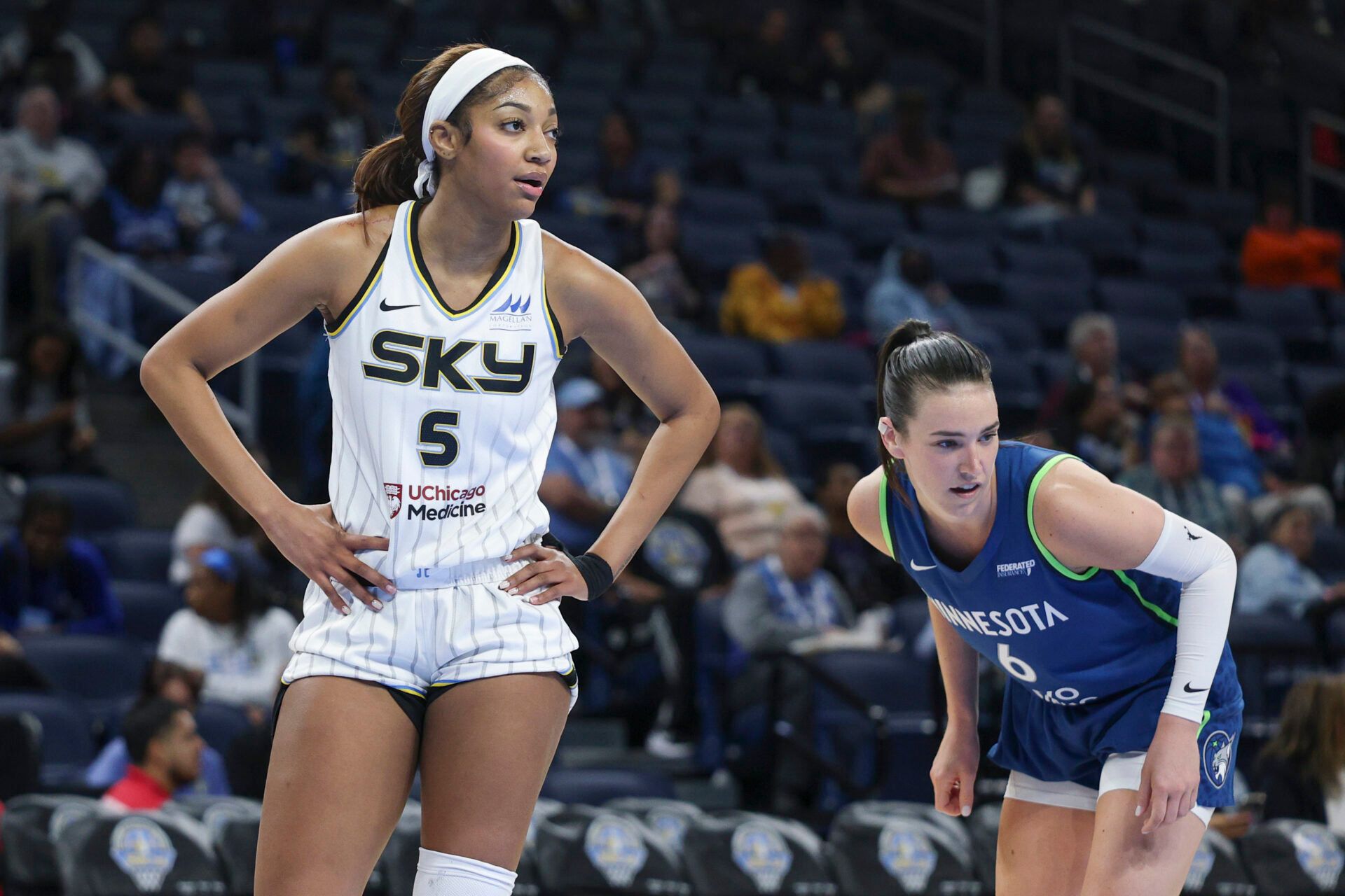 Chicago Sky forward Angel Reese (5) looks on during the first half of a WNBA pre-season game against the Minnesota Lynx at Wintrust Arena.