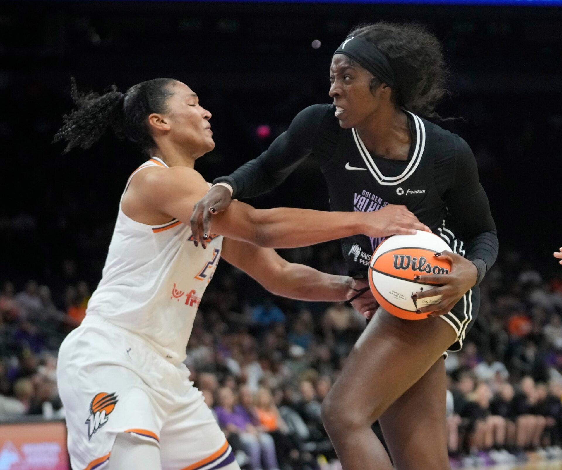 Phoenix Mercury forward Alyssa Thomas (25) defends against Golden State Valkyries forward Laeticia Amihere (3) during pre-season action at PHX Arena May 11, 2025.