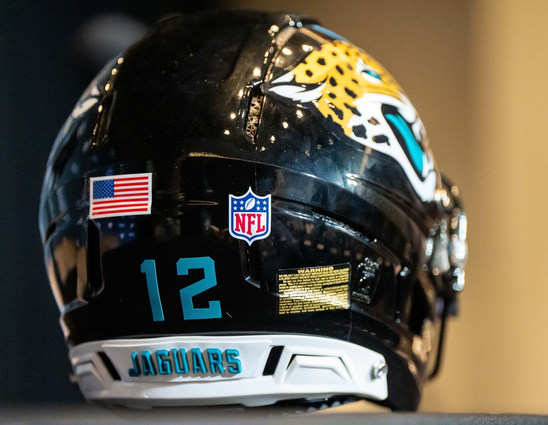 Travis Hunter’s helmet sits on the table before the start fht press conference. The Jacksonville Jaguars’ first-round pick, Colorado Buffaloes wide receiver and defensive back Travis Hunter answered questions during a press conference Friday, March 25, 2025 at Miller Electric Center in Jacksonville, Fla. [Doug Engle/Florida Times-Union]