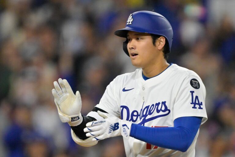 Los Angeles Dodgers designated hitter Shohei Ohtani (17) celebrates after hitting a two-run home run against the Athletics during the fourth inning of the game at Dodger Stadium.