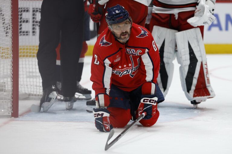 Washington Capitals left wing Alex Ovechkin (8) kneels on the ice after a stoppage in play against the Carolina Hurricanes in the third period in game five of the second round of the 2025 Stanley Cup Playoffs at Capital One Arena.