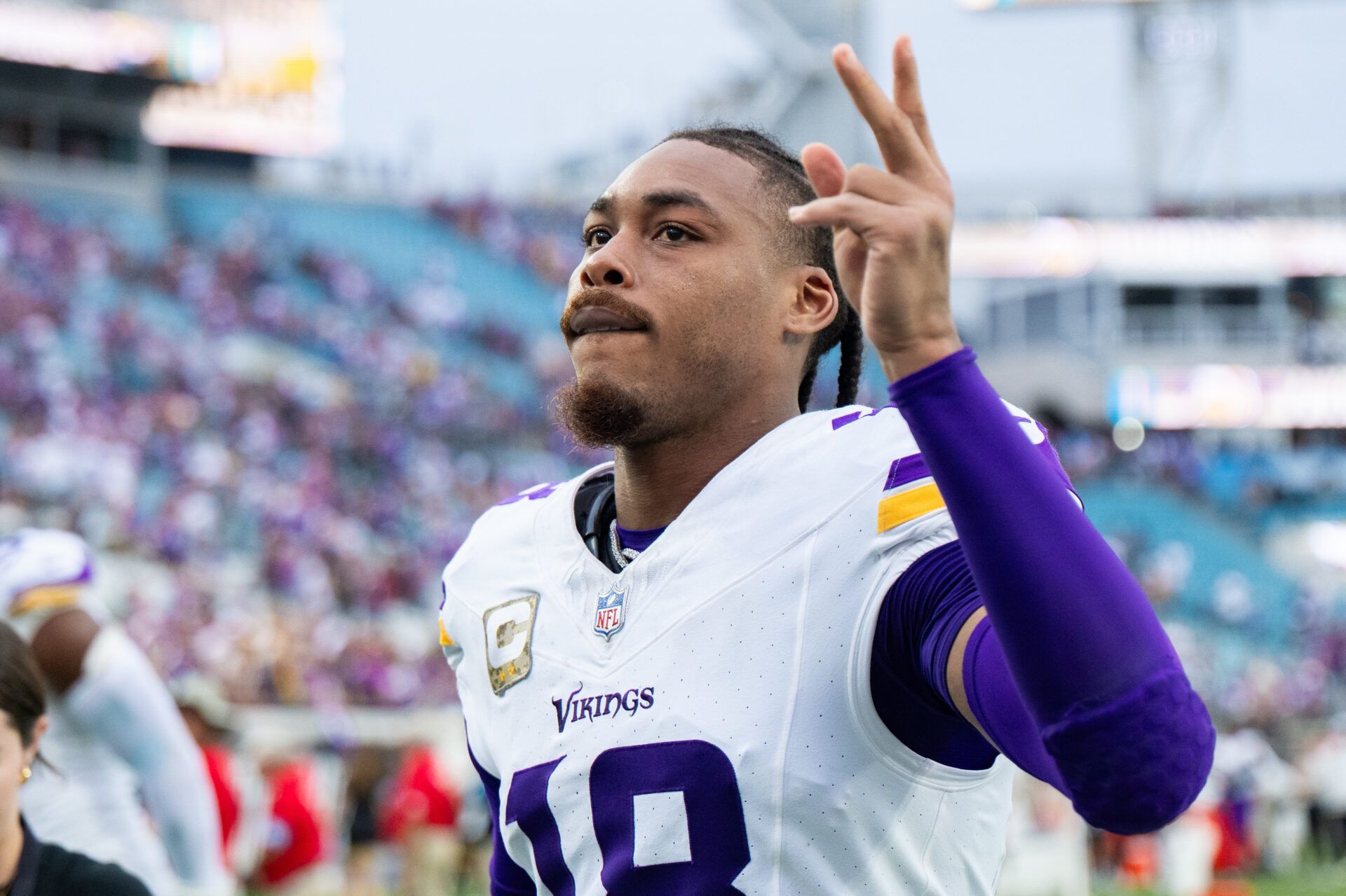 Minnesota Vikings wide receiver Justin Jefferson (18) reacts to the fans after the win over the Jacksonville Jaguars at EverBank Stadium.