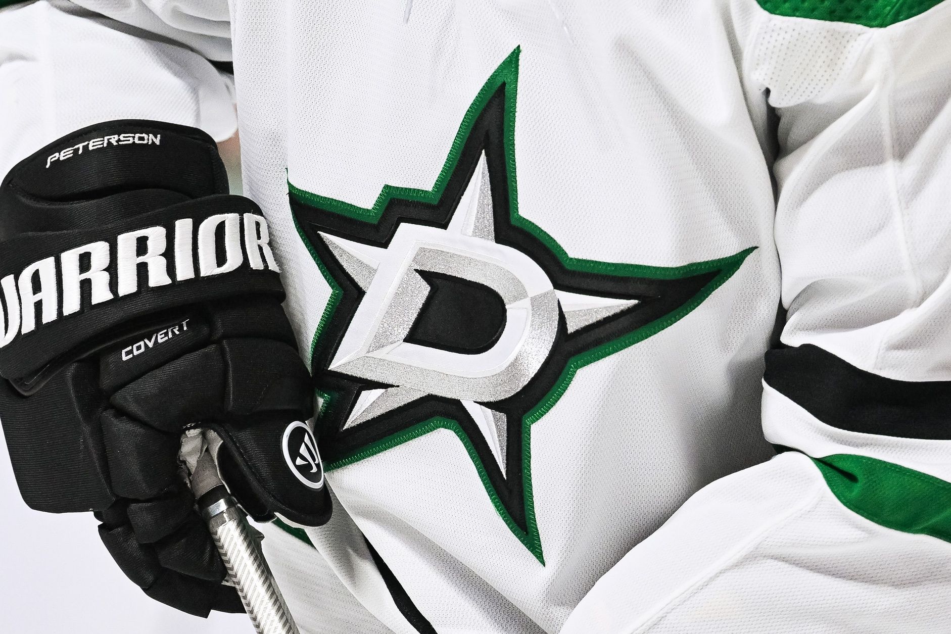View of a Dallas Stars logo on a jersey worn by a member of the team during warmup before the game against the Montreal Canadiens at Bell Centre.