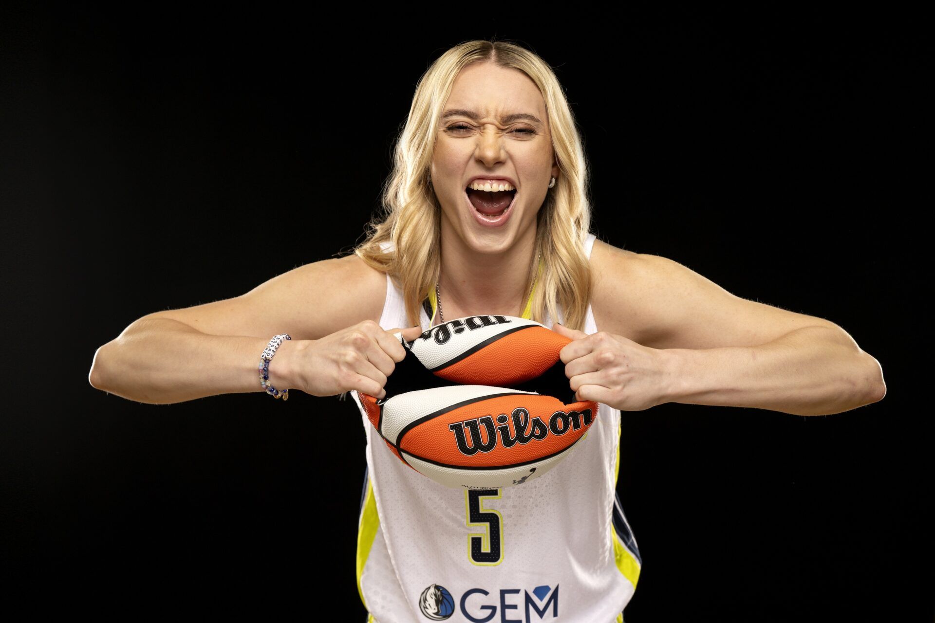 Dallas Wings guard Paige Bueckers poses for a photo during the 2025 Dallas Wings Media Day.