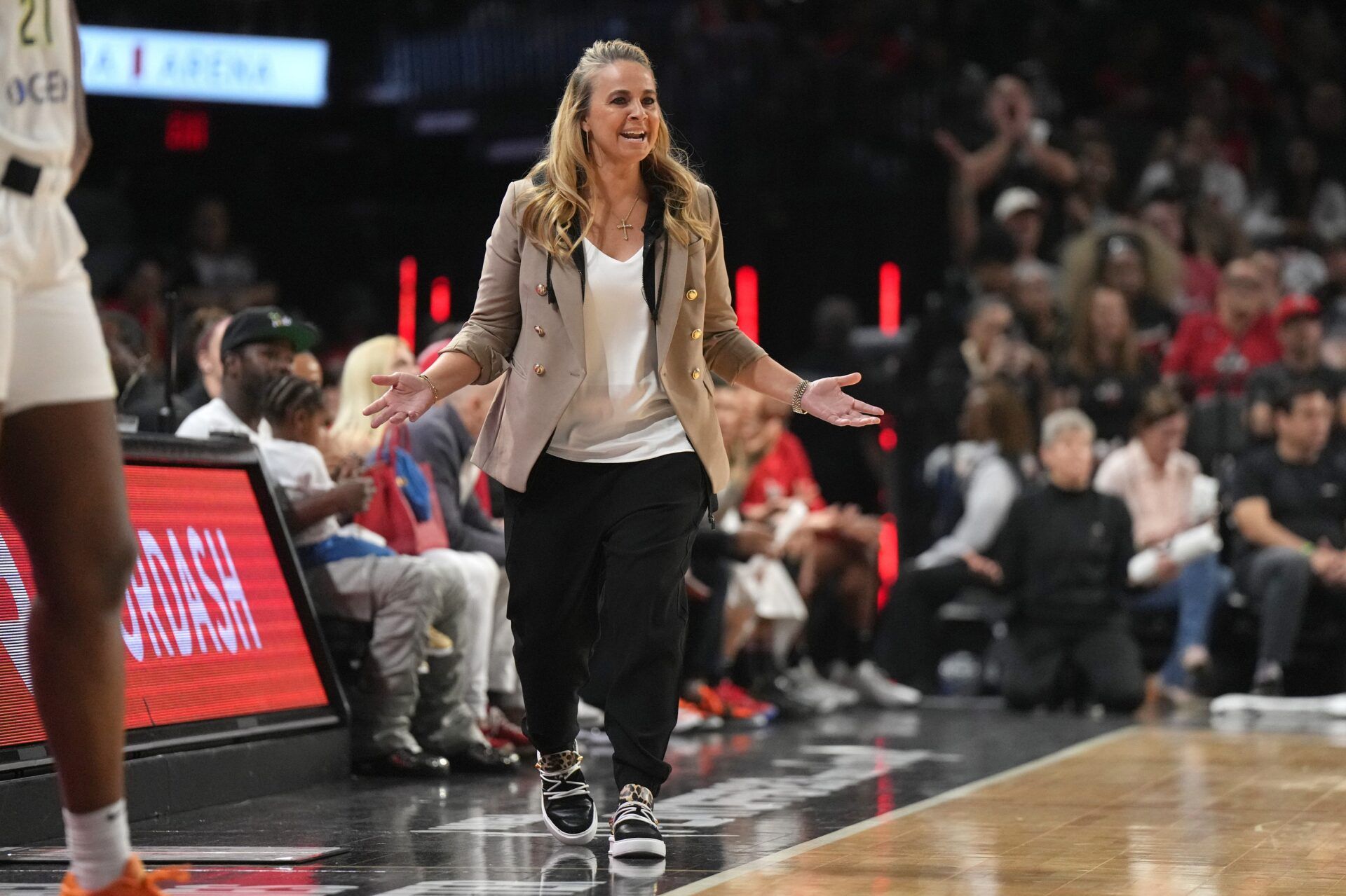Head coach Becky Hammon yells to her players during the first half of game one of the 2023 WNBA Playoffs at Michelob Ultra Arena.