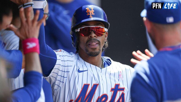 New York Mets shortstop Francisco Lindor (12) celebrates with teammates after hitting a solo home run during the eighth inning against the Chicago Cubs at Citi Field.