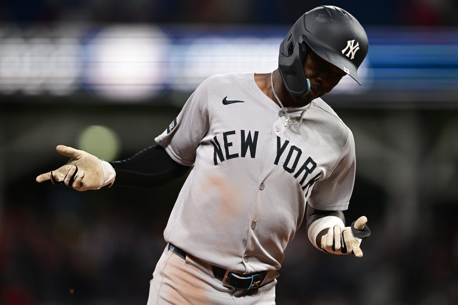 New York Yankees second baseman Jazz Chisholm Jr. (13) runs the bases after hitting a two run home run off Cleveland Guardians relief pitcher Paul Sewald (34) during the eighth inning at Progressive Field.