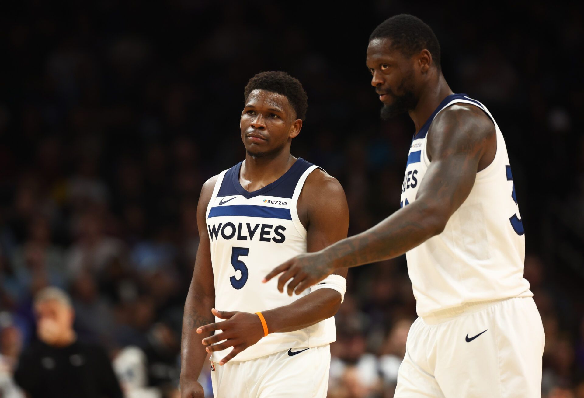 Minnesota Timberwolves guard Anthony Edwards (5) with forward Julius Randle (30) against the Phoenix Suns at Footprint Center.