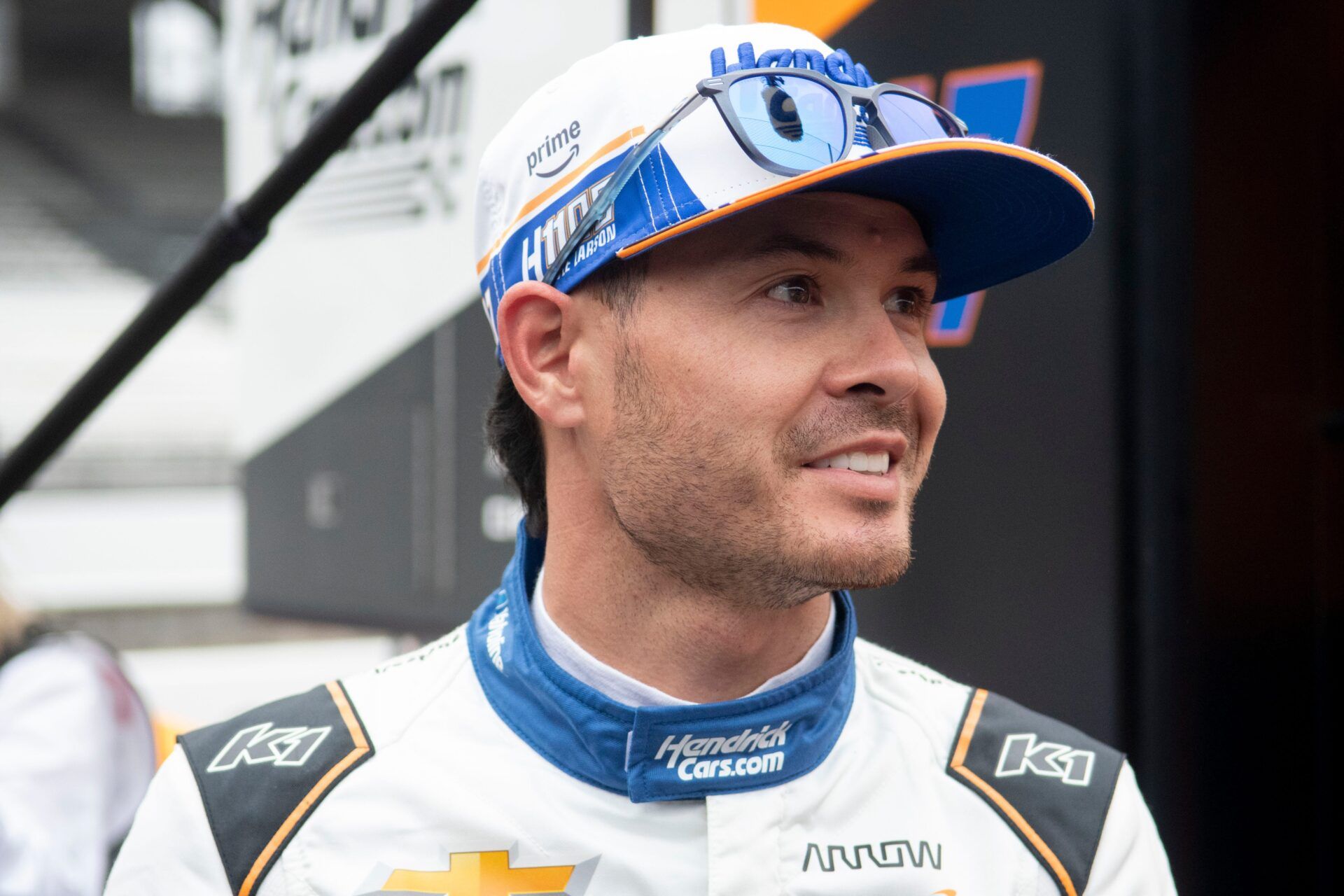 Arrow McLaren driver Kyle Larson (17) smiles by his pit box Friday, May 16, 2025, during Fast Friday ahead of the 109th running of the Indianapolis 500 at Indianapolis Motor Speedway.