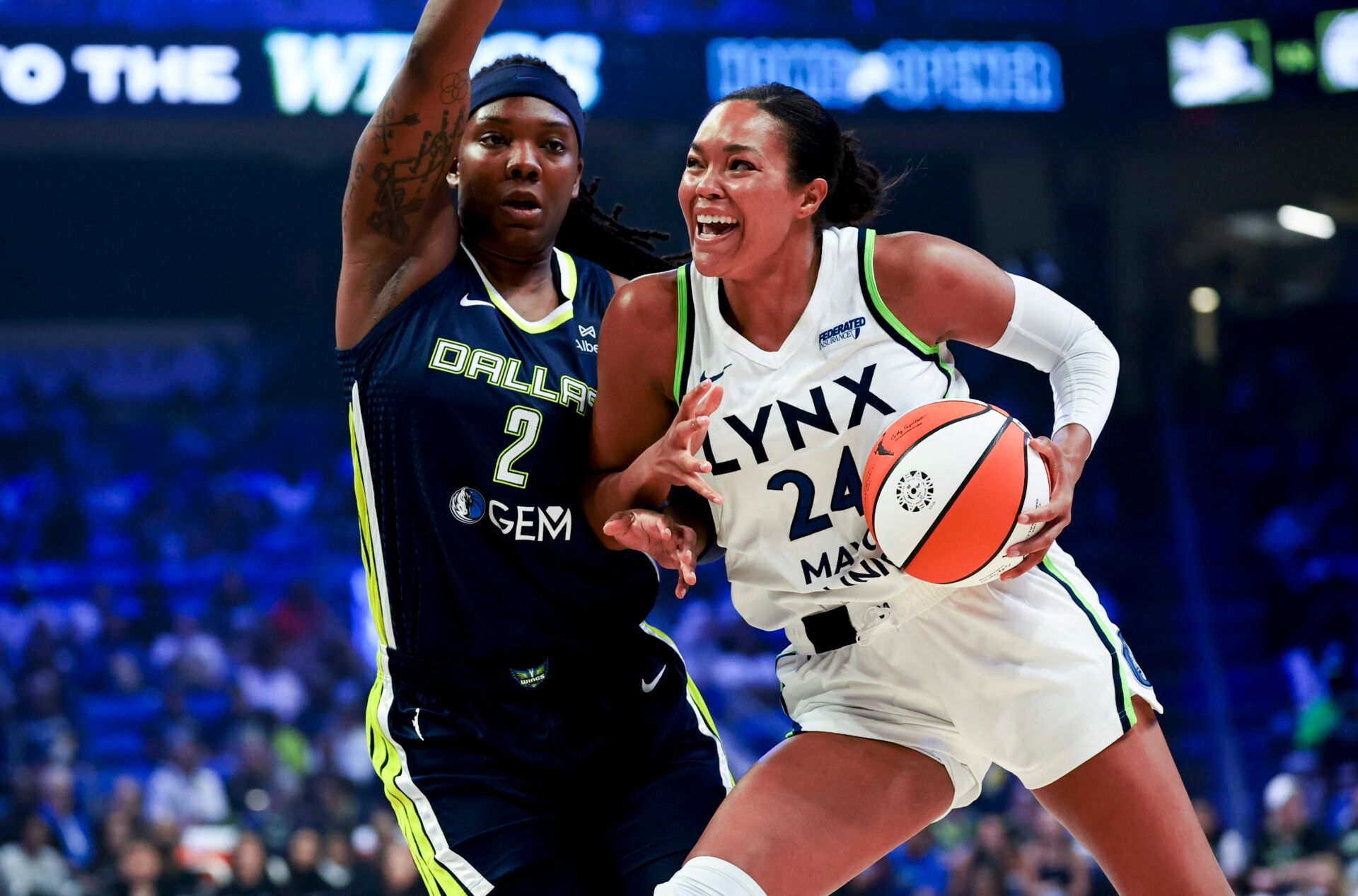 Minnesota Lynx forward Napheesa Collier (24) drives to the basket as Dallas Wings forward Myisha Hines-Allen (2) defends during the first half at College Park Center.