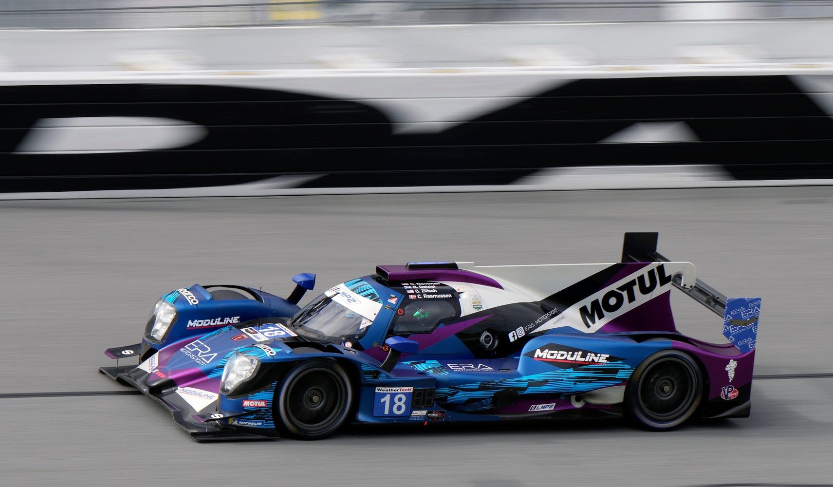 The NO. 18 Oreca LMP2 speeds through the tri-oval during Le Mans Prototype 2 Roar Before the 24 qualifying for the Rolex 24 at Daytona at Daytona International Speedway, Sunday, Jan. 21, 2024.