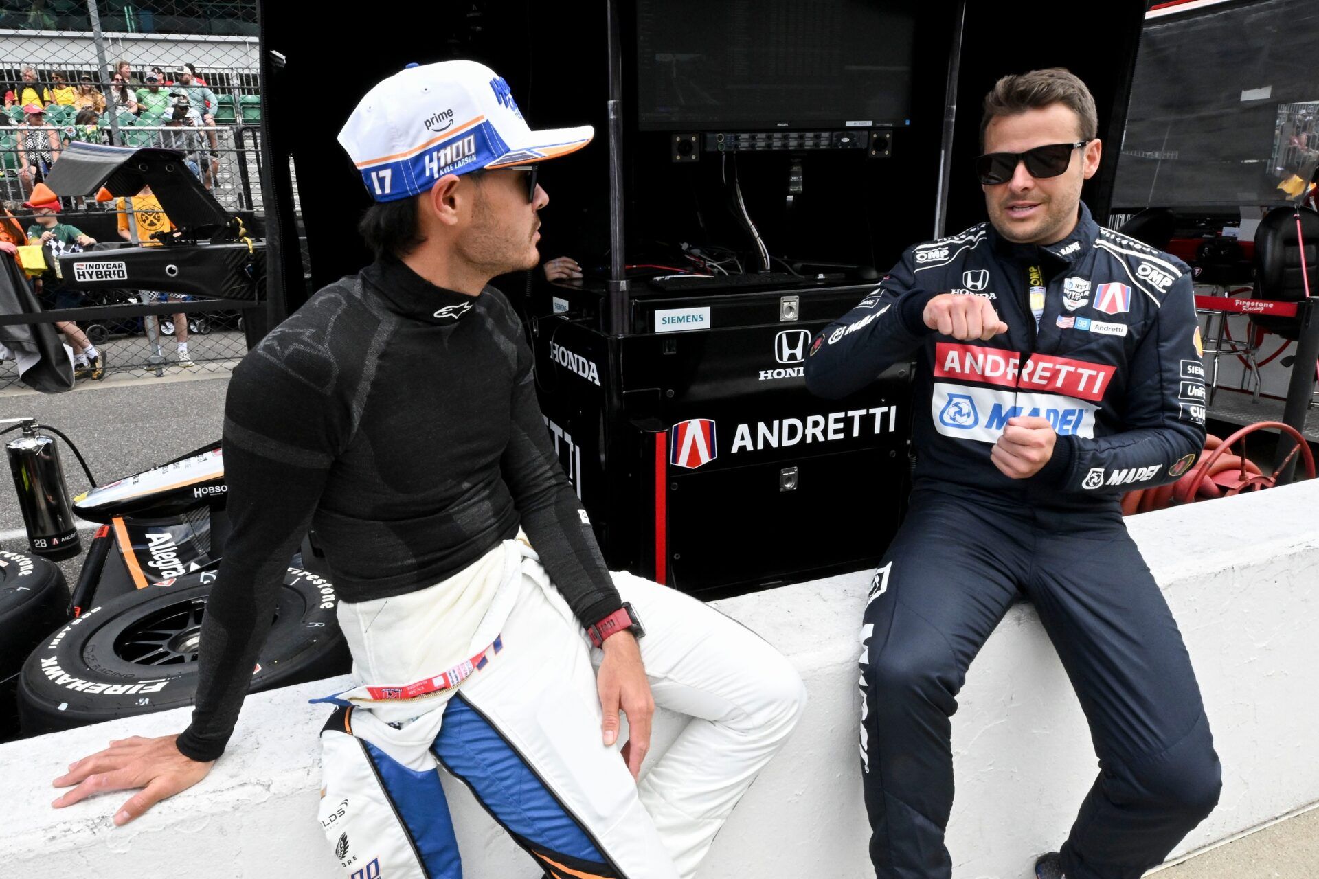 Arrow McLaren driver Kyle Larson (17) talks with Andretti Herta with Marco & Curb-Agajanian driver Marco Andretti (98) on Saturday, May 17, 2025, during qualifying for the 109th running of the Indianapolis 500 at Indianapolis Motor Speedway.