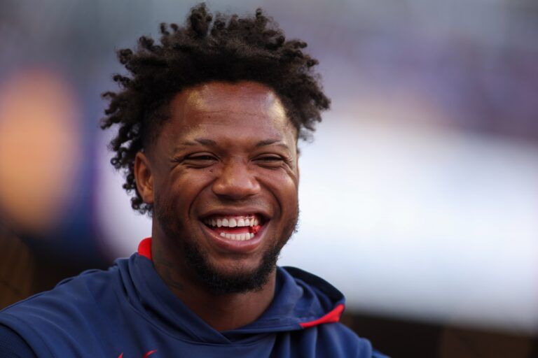 Atlanta Braves right fielder Ronald Acuna Jr. (13) in the dugout against the Washington Nationals in the first inning at Truist Park.