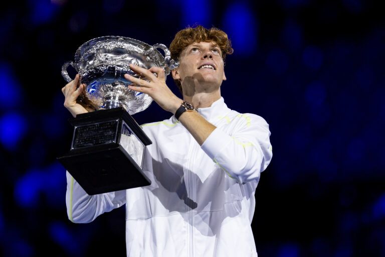 Jannik Sinner of Italy celebrates with the Australian Open title during the prize presentation of the men's single at the 2025 Australian Open at Melbourne Park.