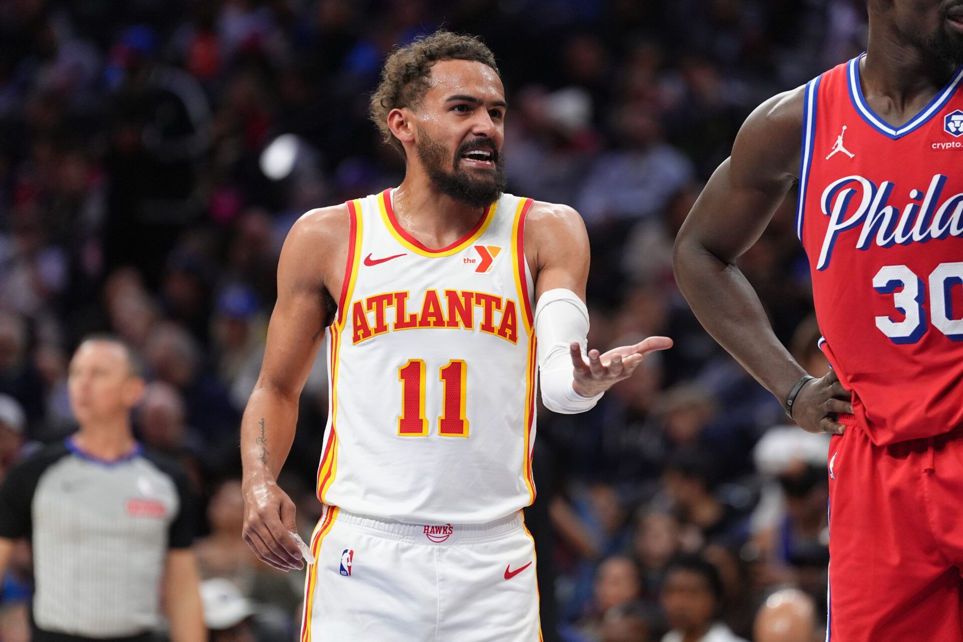 Atlanta Hawks guard Trae Young (11) reacts against the Philadelphia 76ers in the third quarter at Wells Fargo Center.