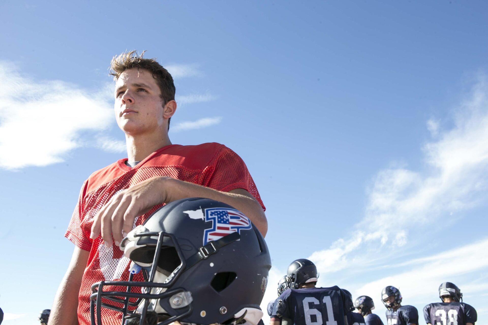 Quarterback Brock Purdy of Perry High School listen to his coach Preston Jones during the practice with his team at the school.