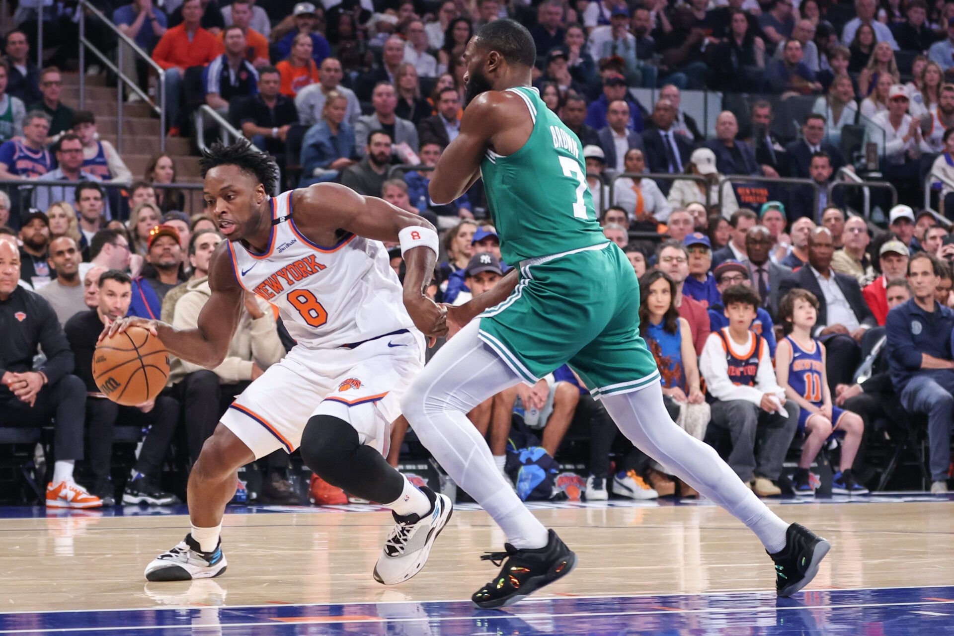 New York Knicks forward OG Anunoby (8) drives past Boston Celtics guard Jaylen Brown (7) in the first quarter during game three of the second round for the 2025 NBA Playoffs at Madison Square Garden.
