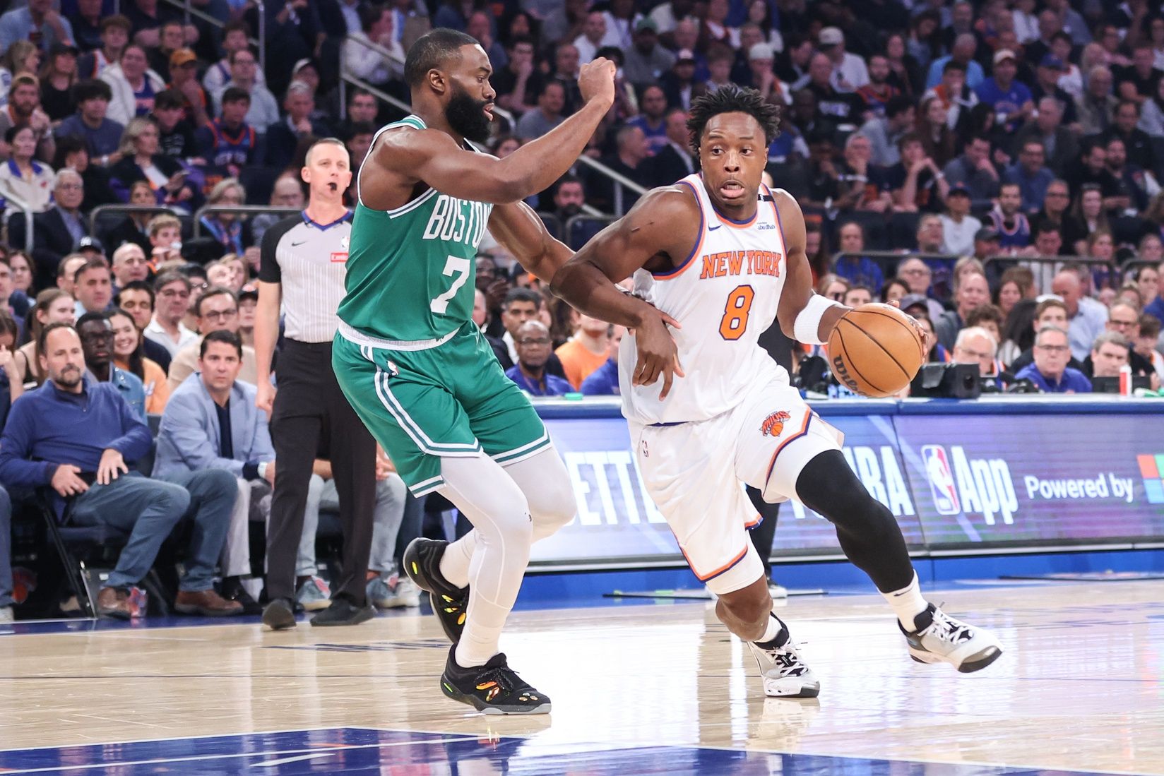 New York Knicks forward OG Anunoby (8) drives past Boston Celtics guard Jaylen Brown (7) in the first quarter during game three of the second round for the 2025 NBA Playoffs at Madison Square Garden.