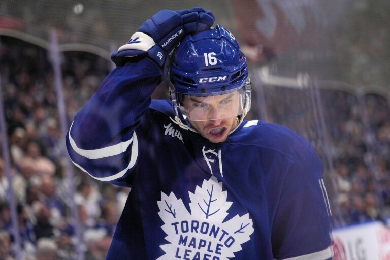 Toronto Maple Leafs forward Mitch Marner (16) adjusts his helmet after a play against the Florida Panthers during the first period of game seven of the second round of the 2025 Stanley Cup Playoffs at Scotiabank Arena.