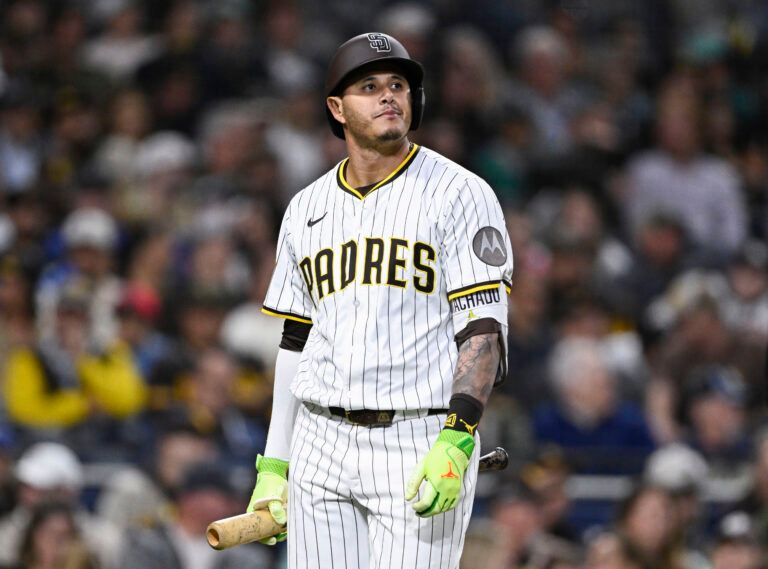 San Diego Padres third baseman Manny Machado (13) walks back to the dugout after striking out during eighth inning against the Seattle Mariners at Petco Park.
