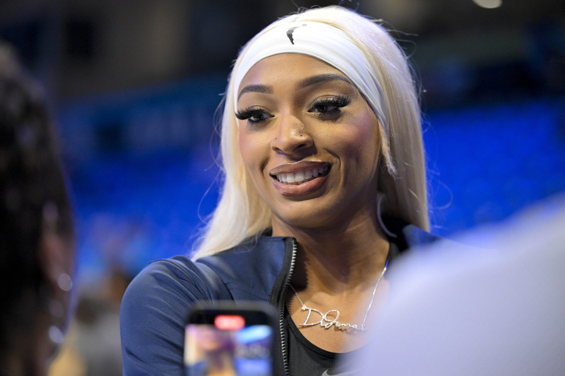 Dallas Wings guard DiJonai Carrington (21) speaks to the media before the game between the Wings and the Seattle Storm at College Park Center.