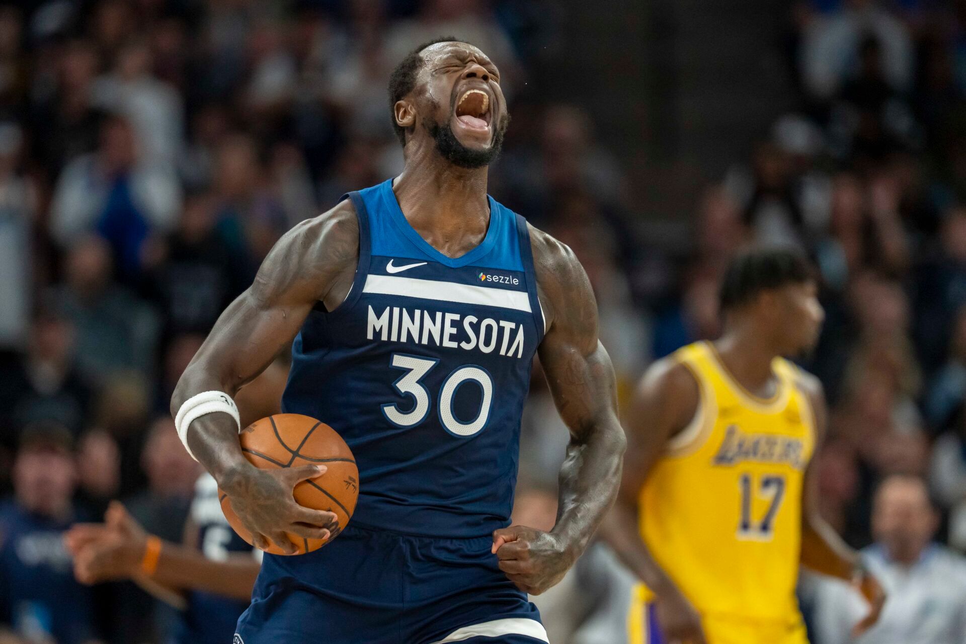 Minnesota Timberwolves forward Julius Randle (30) reacts in celebration after a foul is called against the Los Angeles Lakers in the first half during game three of first round for the 2024 NBA Playoffs at Target Center.