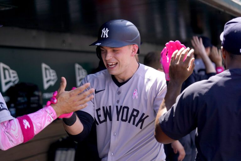 New York Yankees designated hitter Ben Rice (22) is congratulated by teammates after hitting a grand slam against the Athletics in the fifth inning at Sutter Health Park.