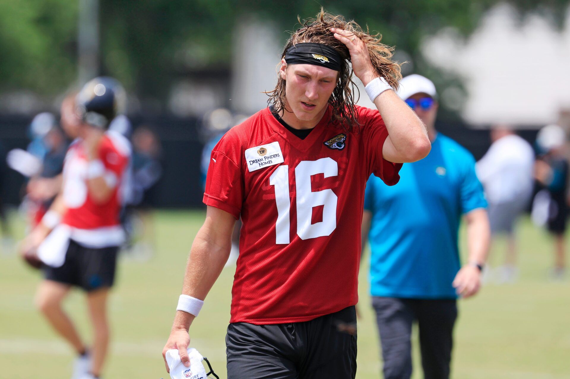 Jacksonville Jaguars quarterback Trevor Lawrence (16) walks off the field during the first organized team activity at Miller Electric Center Monday, May 19, 2025 in Jacksonville, Fla.