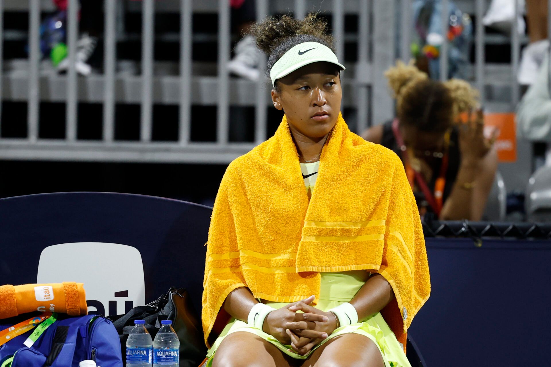 Naomi Osaka (JPN) sits in her player's chair during a changeover against Liudmila Samsonova (not pictured) on day three of the Miami Open at Hard Rock Stadium.