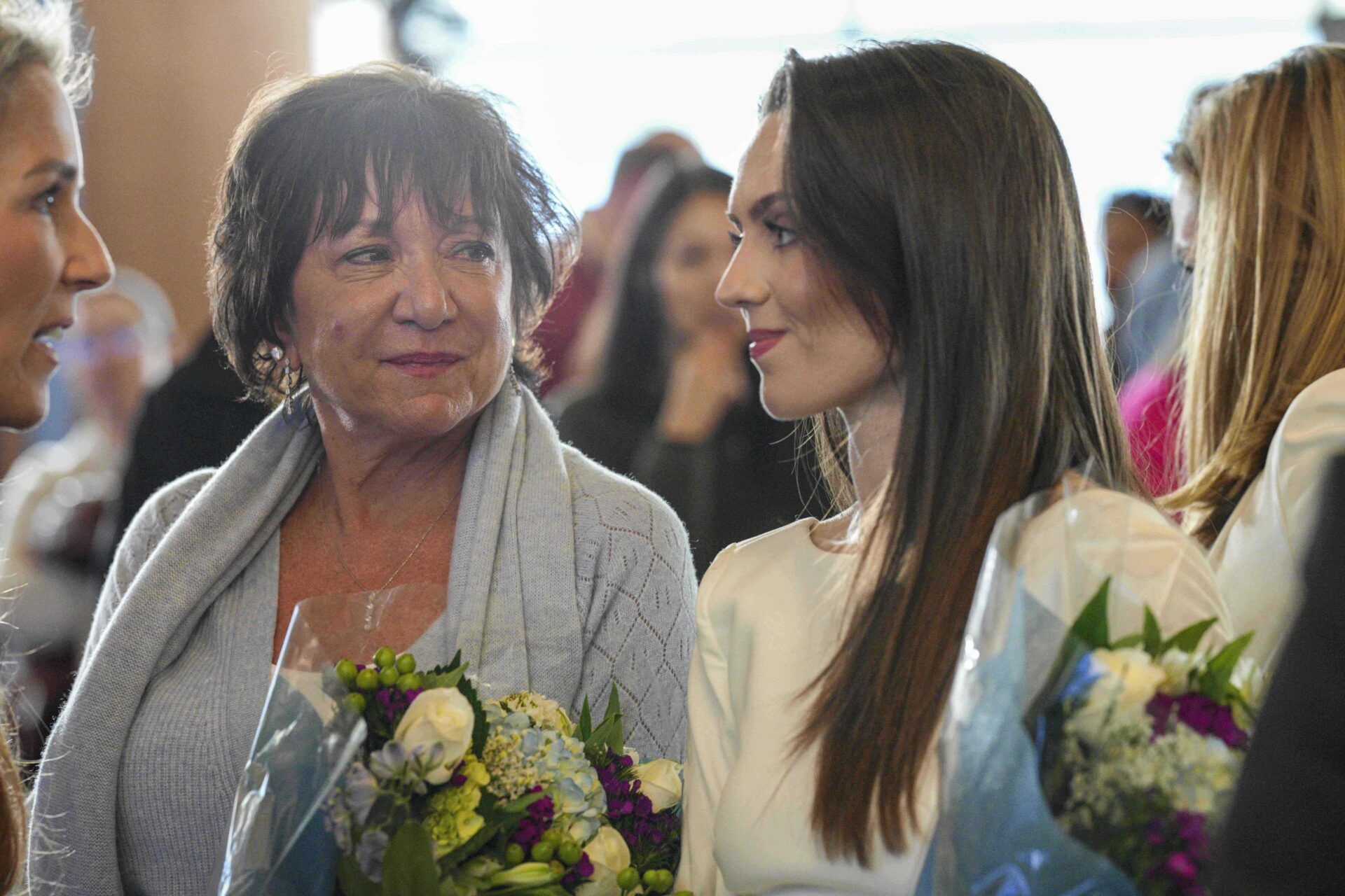 Millie Lombardi and Bill Belichicks girlfriend Jordon Hudson in attendance at the press conference at Loudermilk Center for Excellence.