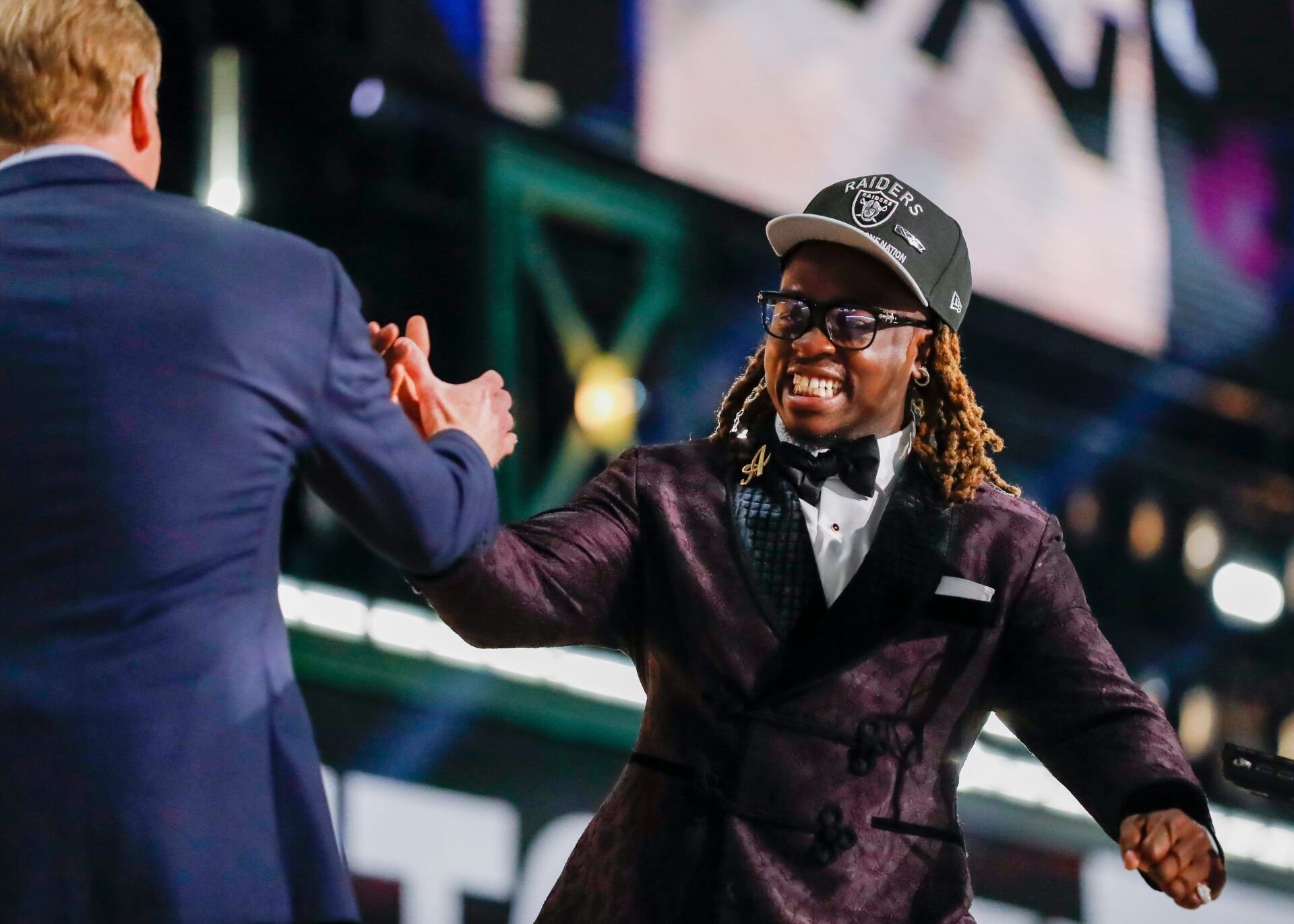 Running back Ashton Jeanty slaps hands with NFL Commissioner Roger Goodell after being selected sixth overall by the Las Vegas Raiders during the first round of the 2025 NFL Draft on Thursday, April 24, 2025, at Lambeau Field in Green Bay, Wisconsin. The draft runs through April 26.
Tork Mason/USA TODAY NETWORK-Wisconsin