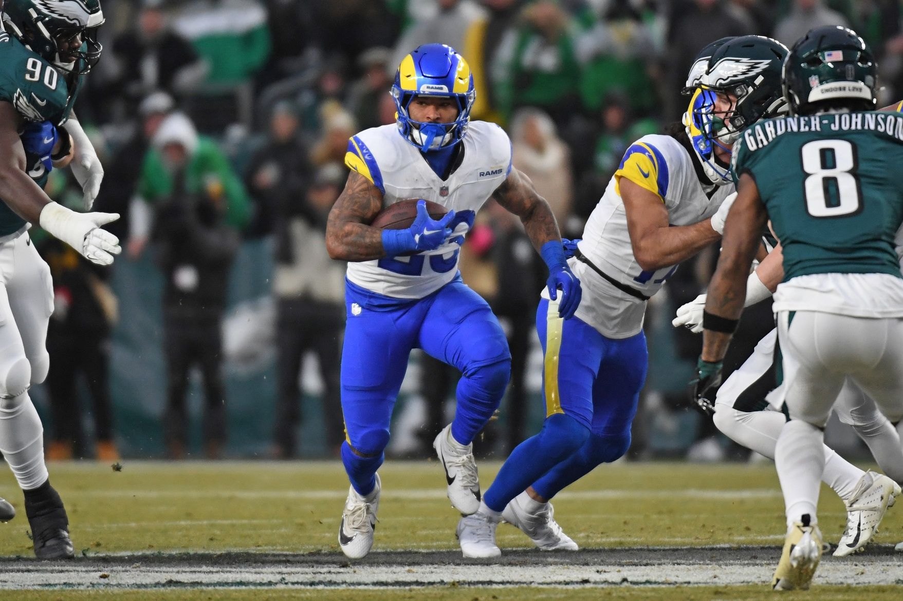 Los Angeles Rams running back Kyren Williams (23) runs with the ball against the Philadelphia Eagles in a 2025 NFC divisional round game at Lincoln Financial Field.