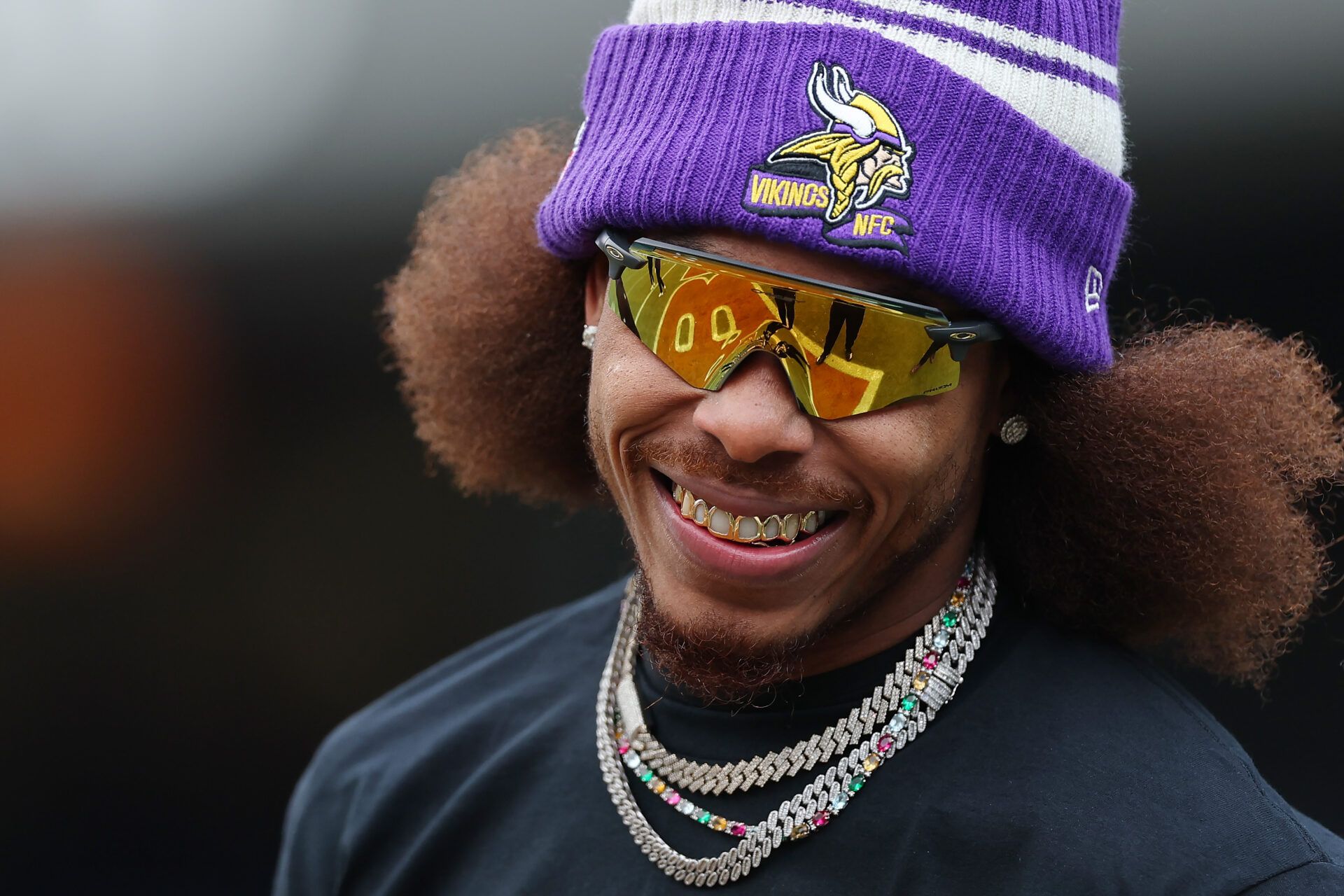 CHICAGO, ILLINOIS - JANUARY 08:  Wide receiver Justin Jefferson #18 of the Minnesota Vikings warms up prior to the game against the Chicago Bears at Soldier Field on January 08, 2023 in Chicago, Illinois. (Photo by Michael Reaves/Getty Images)