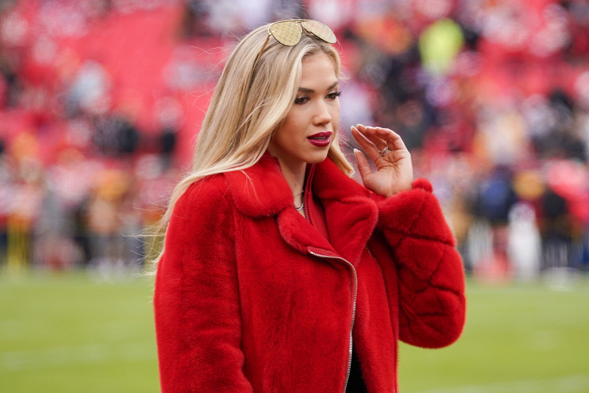 Gracie Hunt on field prior to a game between the Kansas City Chiefs and Las Vegas Raiders at GEHA Field at Arrowhead Stadium.