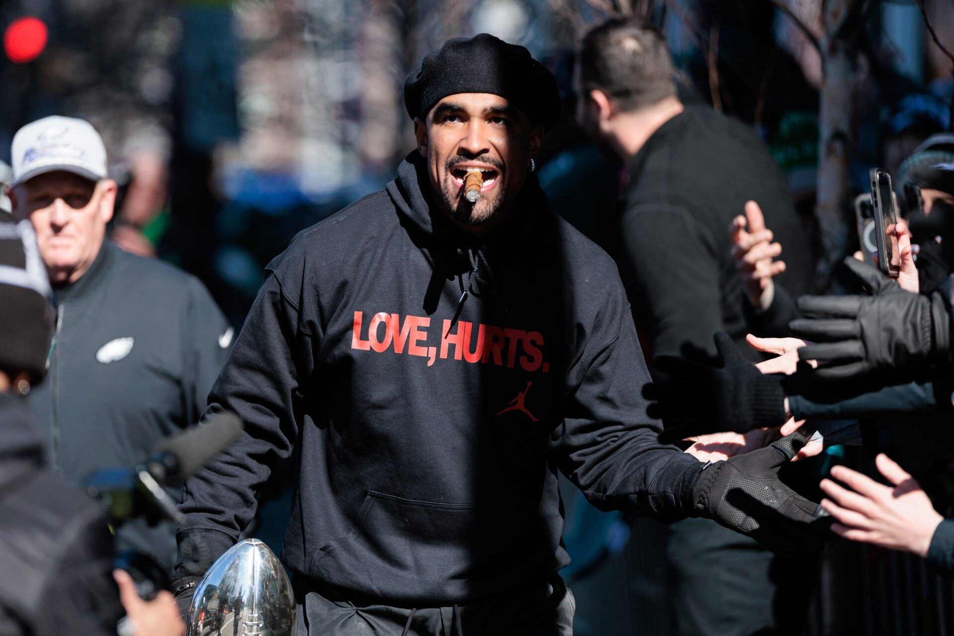 Philadelphia Eagles quarterback Jalen Hurts (1) celebrates with the Lombardi Trophy during the Super Bowl LIX championship parade and rally.