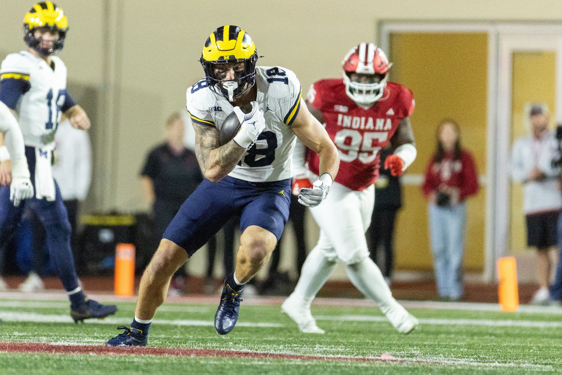 Michigan Wolverines tight end Colston Loveland (18) runs with the ball in the second half against the Indiana Hoosiers at Memorial Stadium.