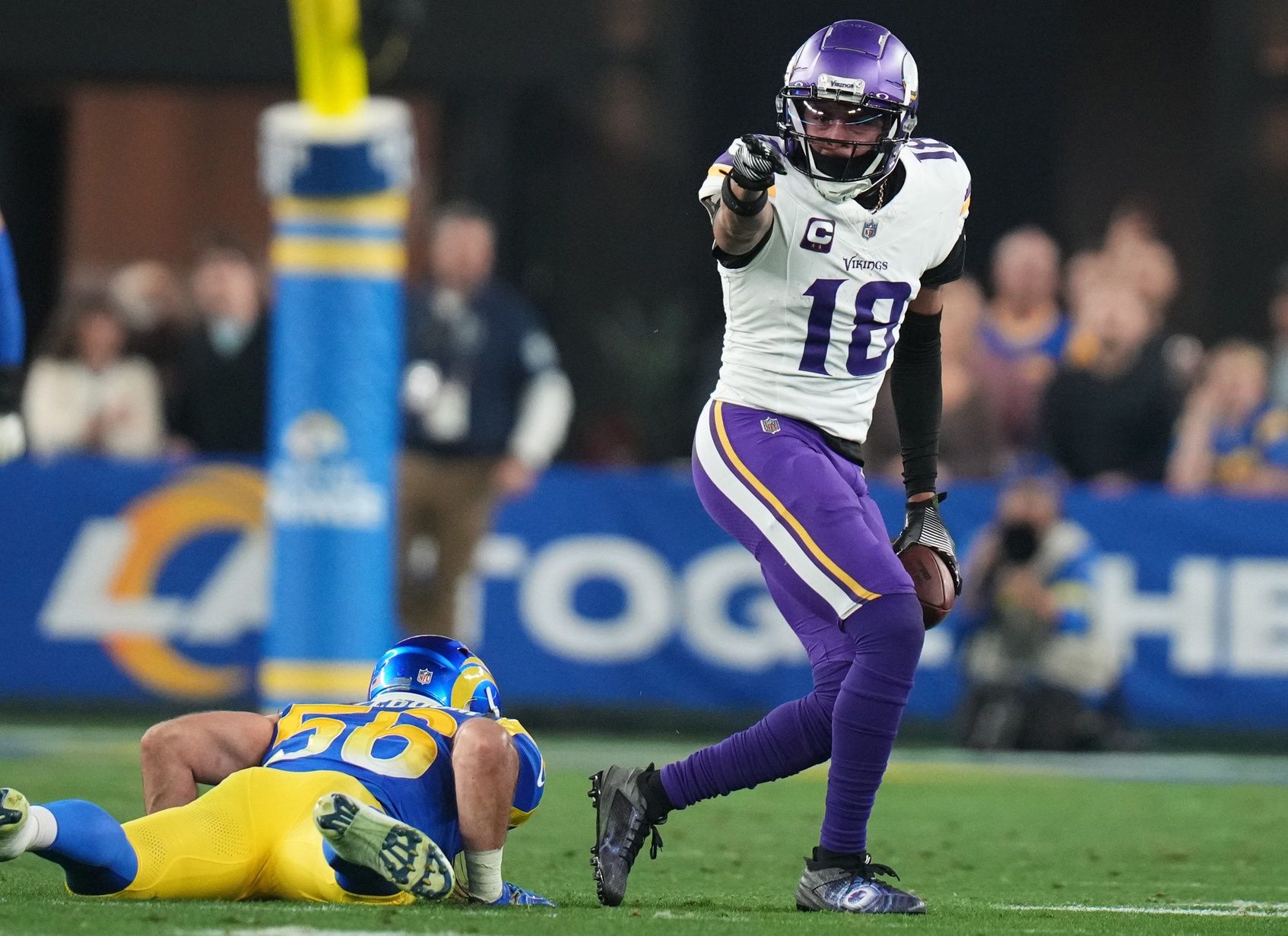 Minnesota Vikings receiver Justin Jefferson (18) signals a first down after a catch against the Los Angeles Rams during their playoff game at State Farm Stadium on Jan. 13, 2025, in Glendale.

© Joseph Rondone/The Republic / USA TODAY NETWORK via Imagn Images
