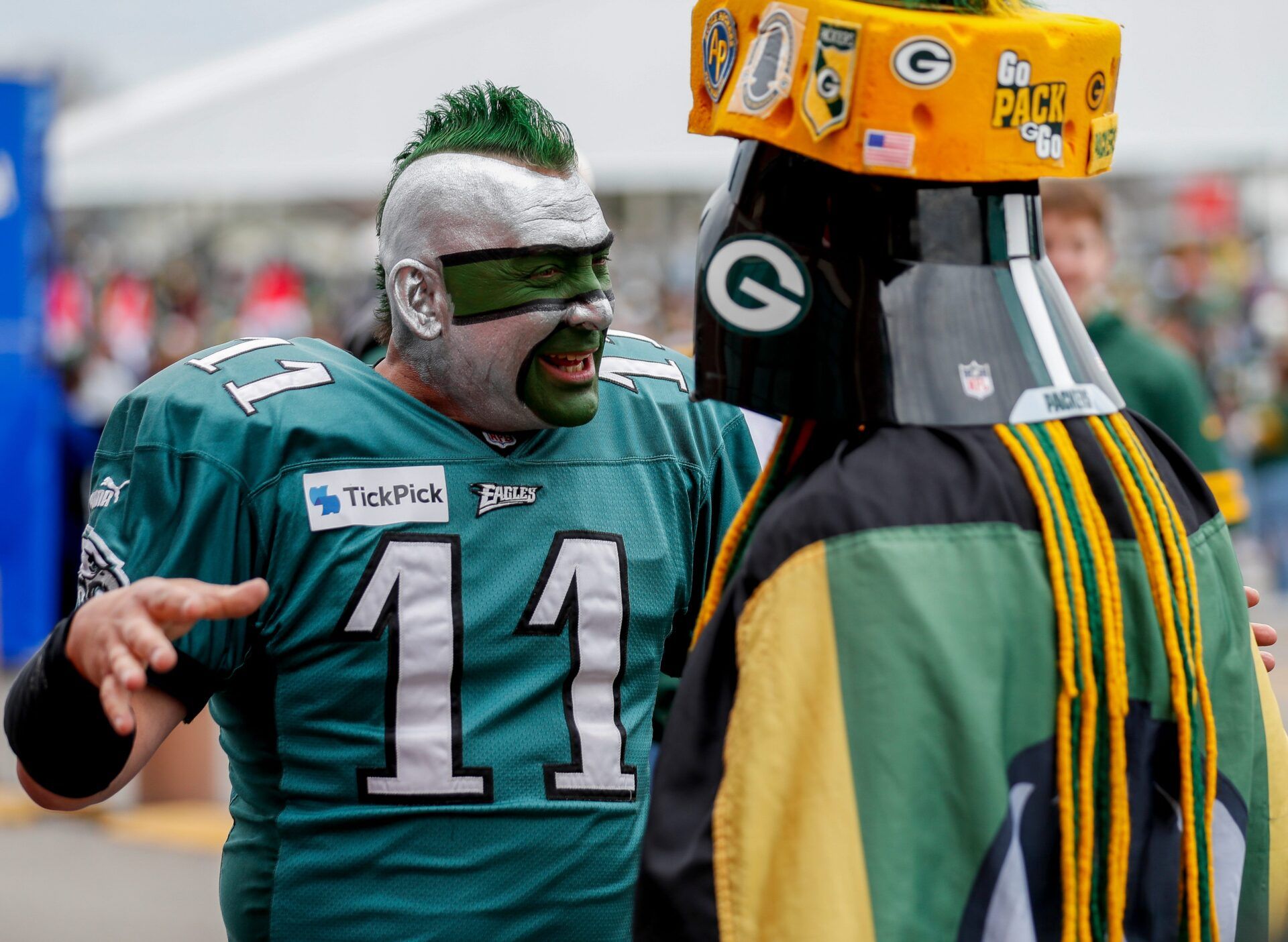 Philadelphia Eagle super fan Jamie “The Philly Sports Guy” Pagliei talks with Green Bay Packers super fan Edgar “Pack Vader” Reyes in the Draft Experience during the first day of the 2025 NFL Draft on Thursday, April 24, 2025, at Lambeau Field in Green Bay, Wisconsin. The draft begins at 7 p.m. CT April 24 and runs through April 26.
Tork Mason/USA TODAY NETWORK-Wisconsin