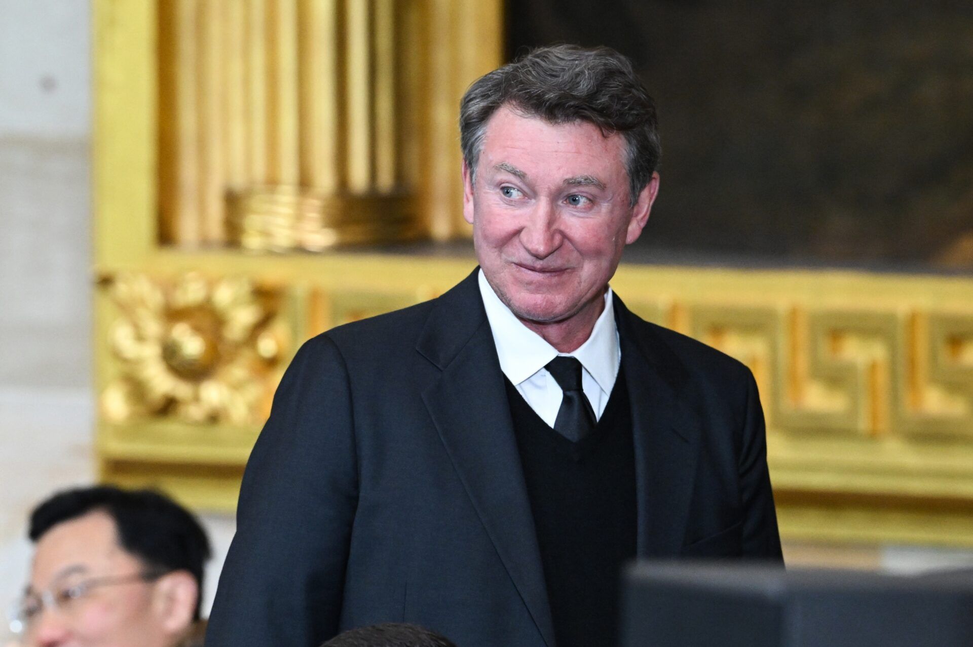 Canadian retired professional hockey player Wayne Gretzky arrives for the inauguration ceremony before Donald Trump is sworn in as the 47th US President in the US Capitol Rotunda in Washington, DC, on January 20, 2025.