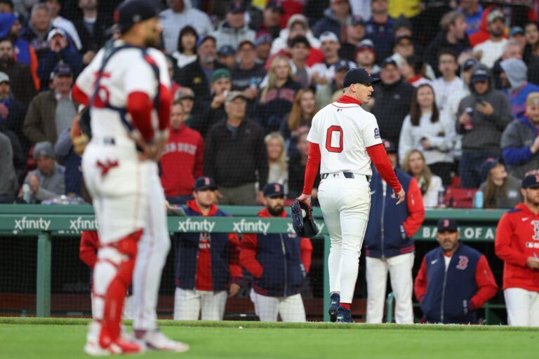 Boston Red Sox starting pitcher Walker Buehler (0) walks off the field after being ejected during the third inning against the New York Mets at Fenway Park.