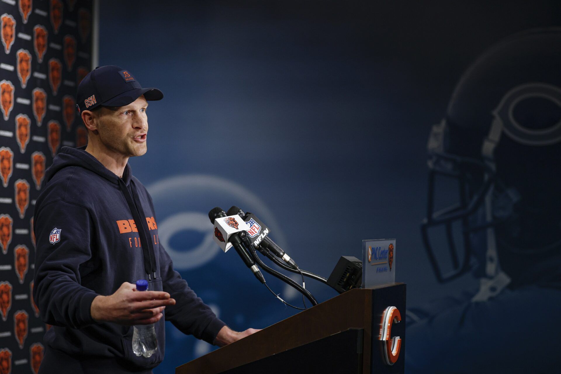 Chicago Bears head coach Ben Johnson (R) speaks during the Rookie Minicamp at Halas Hall.